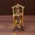 Craftam Metal Golden Lord Ganesha Statue Sitting on Chair and Reading Ramayan Figurine of Lord Ganesh for Home Decorative and Gifts (6 inch, Gold)
