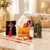 Rakhi Gift for Brother Set with 4 Designer Rakhi, Rama Lalla Car Idol, Greeting Card & Roli Chawal | Raksha Bandhan Gift Hamper